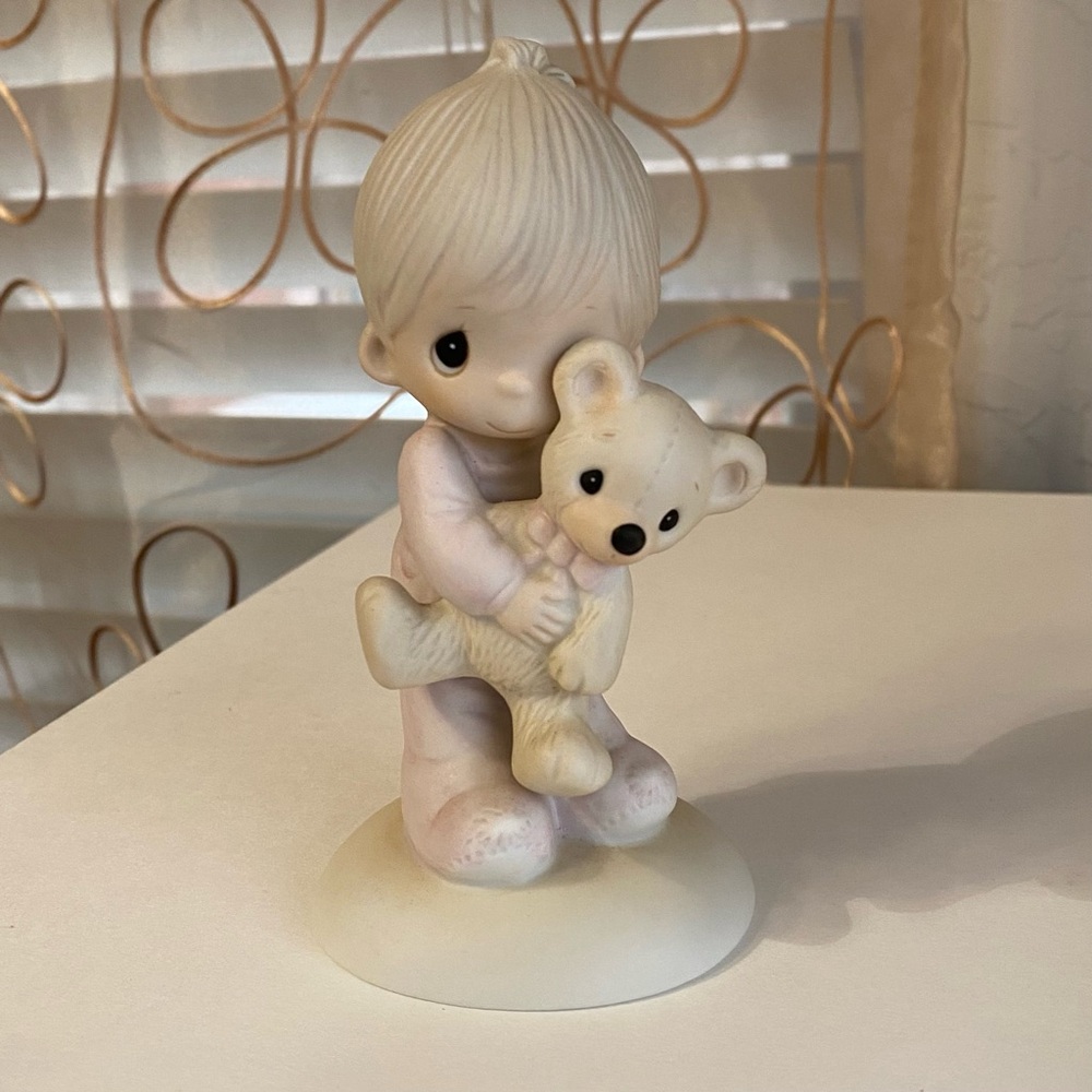 Vintage Precious Moments boy in pajamas with teddy bear figurine